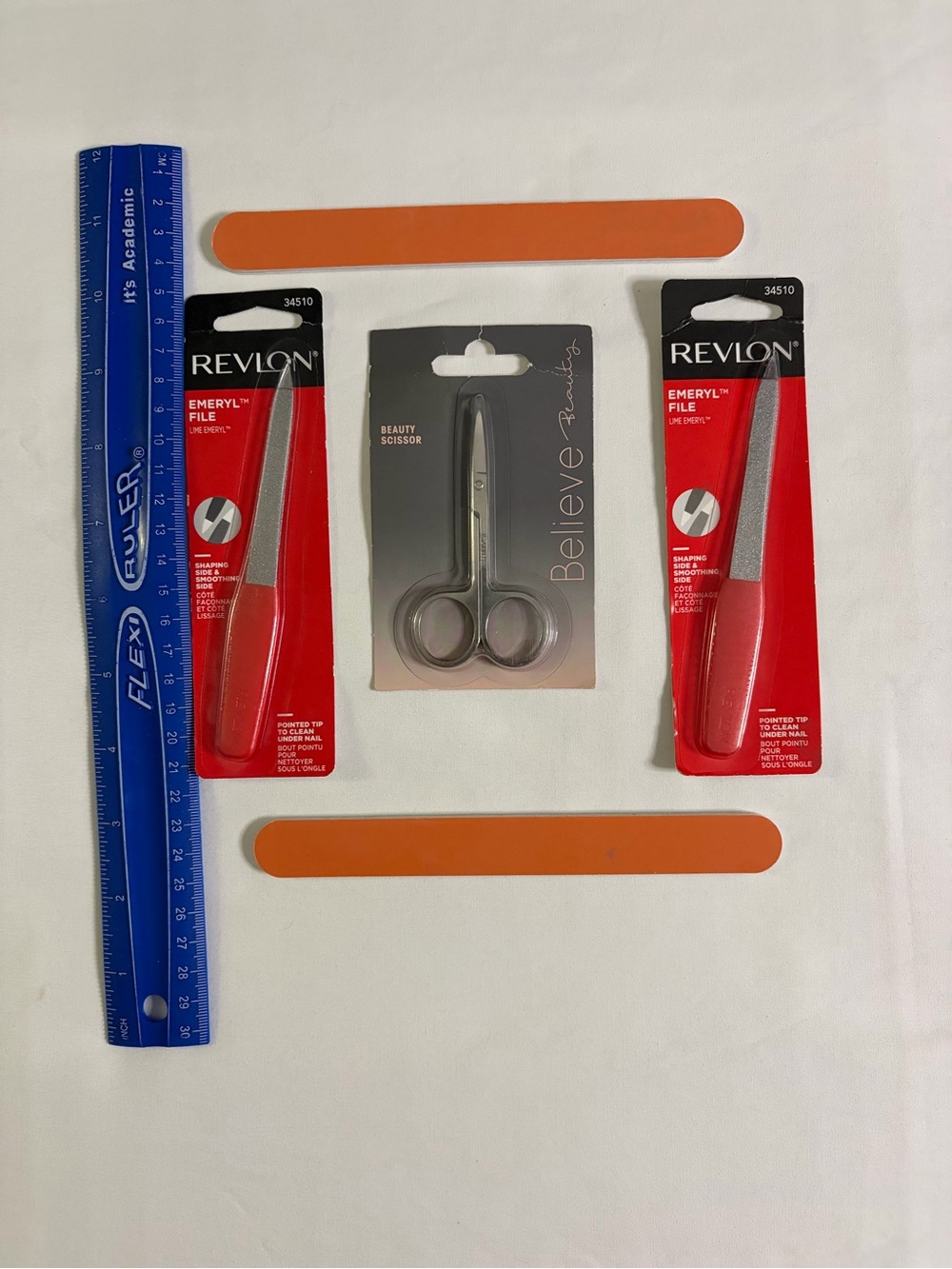 (1) Believe Beauty Scissor (2) Revlon Emeryl Files (2) Nail Files (5) Total